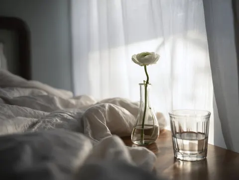 Dawn bedside flower still life prompt