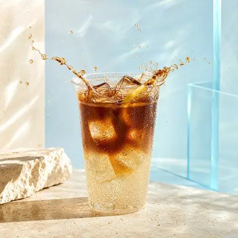 Unbranded Iced Coffee Soda Splash Advertising Prompt